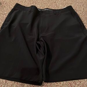 Men’s black shorts.